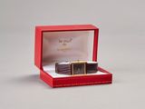 a red box with a watch inside of it
