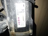 a close up of a metal object with a tag on it