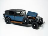 a model of a blue car with a black top