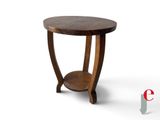 a close up of a wooden table with a shelf on it
