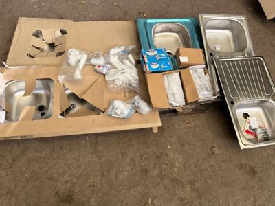 many items that are sitting on the floor next to each other
