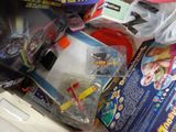 a pile of toys that are sitting on a table