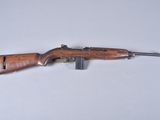 the rifle is laying on the table ready to be used