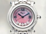 une image montrant un gros plan d'une montre-bracelet au cadran rose