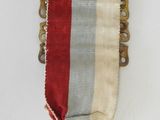 an old medal with a gold medal on a white background