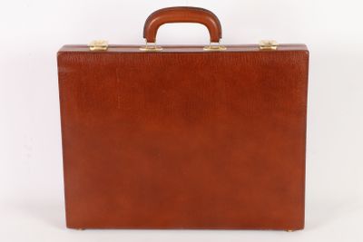 brown leather briefcase on white background