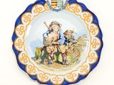 a plate with a picture of a man and a boy on it