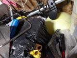 a pile of assorted items sitting on the floor