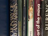 a lot of books on the shelf in the box