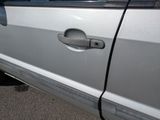 a close up of a door handle on a car