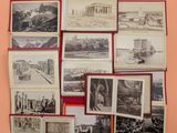 a lot of old black and white photos on the wall