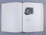 an open book with a picture of a cat on it