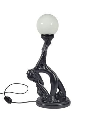 une lampe noire surmontée d'une boule blanche