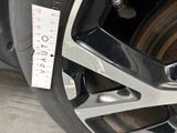 a close up of a tire with a sticker on it