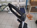 a black and white hand truck that is on the floor