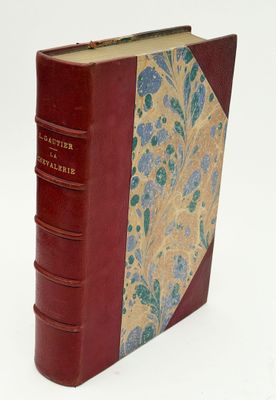 a red book with a floral design on it