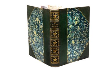 une image représentant un livre à la couverture bleue et aux bords dorés