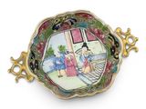 a plate with a painting on it on a white surface