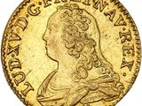 une pièce d'or « sovereign » sur laquelle figure la tête d'une femme