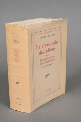 the front cover of a book with a picture of a cat sitting on top of it