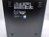 a close up of the back of a laptop with a battery