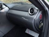 a close up of a steering wheel in a car