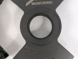 two circular cutters that are on a white surface