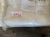 a white pillow that has a price tag on it