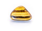 yellow tiger eye stone on a white background