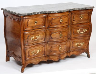 a marble top dresser with many drawers on it