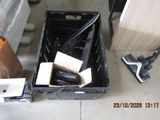 a black box with tools in it sitting on the floor