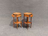 pair of small side tables in the style of louis xv