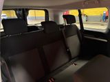 the back seats of a car are empty in a parking lot