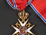 a close up of a medal with a ribbon around it