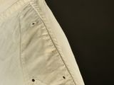 a close up of a white shirt on a mannequin mannequin