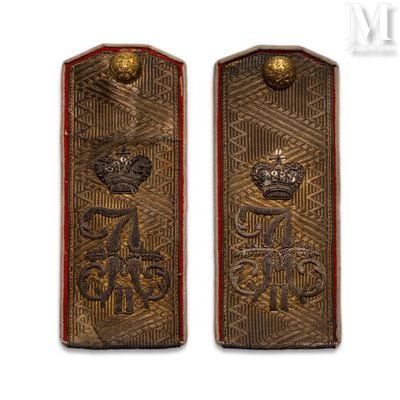 pair of british army shoulder boards with gold and red trims
