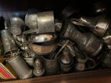 a wooden box full of old silverware and utensils
