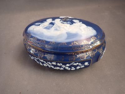 a blue and white box with a picture of a woman on it
