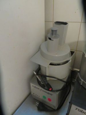 a blender sitting on top of a counter in a kitchen
