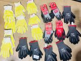 many pairs of gloves that are on the floor