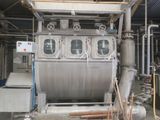 a large machine that is sitting inside of a building