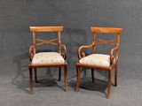 paire de chaises anciennes avec accoudoirs rembourrés