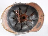 a helmet that has a hole in the middle of it