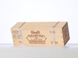 a wooden box with a sign on it that says grand vin lafitte