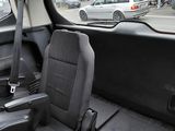 a view of the inside of a car from the driver ' s seat