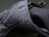 a close up of a pair of gloves on a table