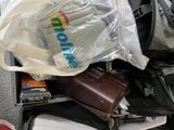 a pile of luggage sitting on top of a table