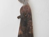 an image of a metal sculpture of a woman