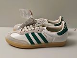 adidas gazelle trainers in white with green stripes