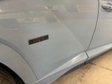a car that has a sticker on the side of it